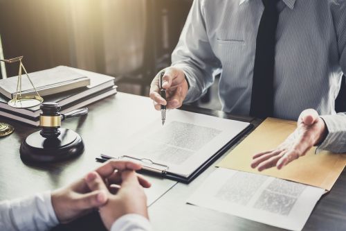 Businessman and Male lawyer or judge consult having team meeting with client, Law and Legal services concept